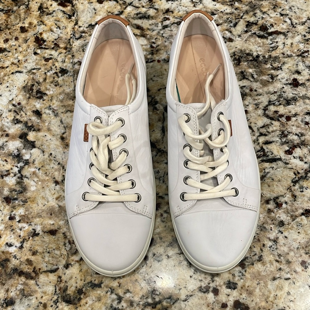 Women’s 42 (11) white lace up shoes. New without tags. Never worn.